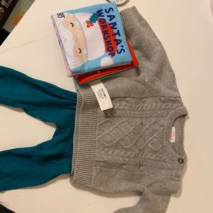New Born brand new outfit. Free baby Christmas crinkle book included.